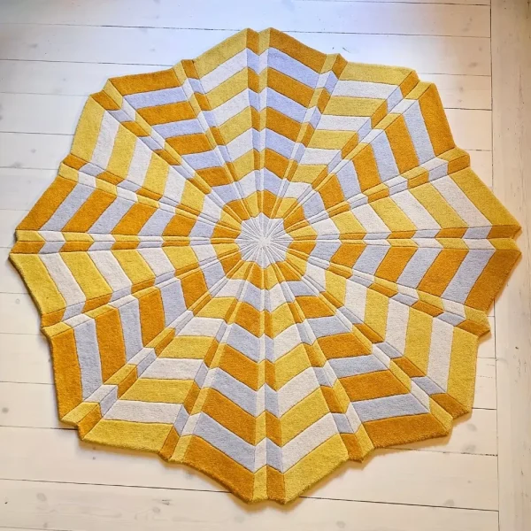 Annika Johansson's art painting Star as handmade rug in yellow and white, playful shape and 3d effect
