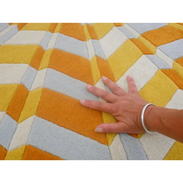 Annika Johansson's art painting Star as handmade rug in yellow and white, playful shape and 3d effect