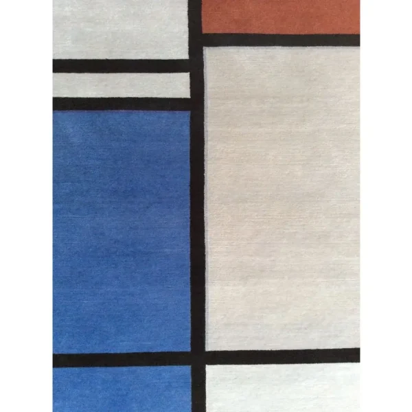 Primer plano de alfombra inspirada en Piet Mondrian «Composición con rojo, azul, negro, amarillo y gris», hecha a mano por encargo.