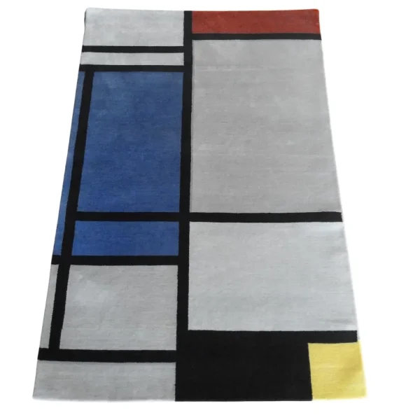 Alfombra inspirada en Piet Mondrian «Composición con rojo, azul, negro, amarillo y gris», hecha a mano por encargo.