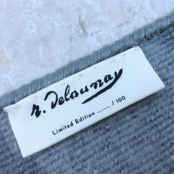 Étiquette pour tapis de la collection en édition limitée et numérotée inspirée de l'œuvre de Robert Delaunay