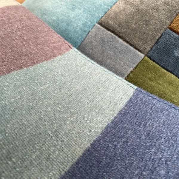 Close up to rug after Paul Klee "Fire in the Evening" custom handmade art rug