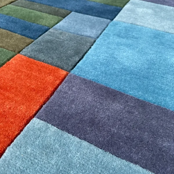 Close up to rug after Paul Klee "Fire in the Evening" custom handmade art rug