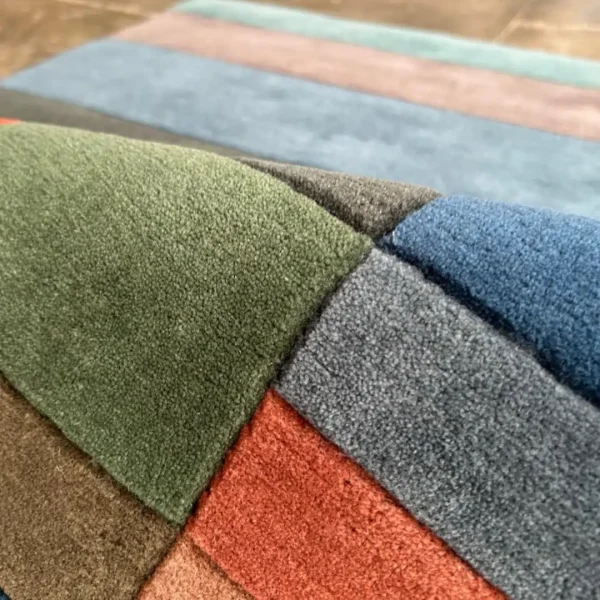 Close up to rug after Paul Klee "Fire in the Evening" custom handmade art rug