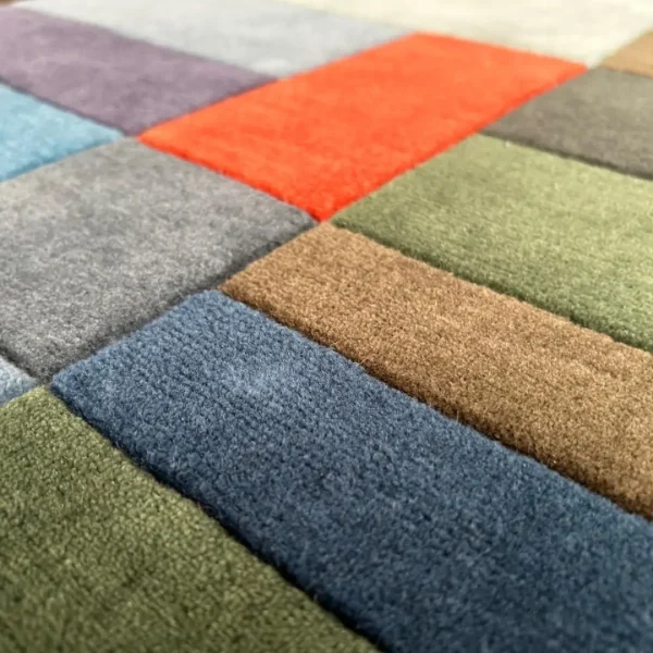 Close up to rug after Paul Klee "Fire in the Evening" custom handmade art rug