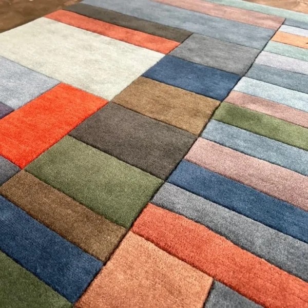 Close up to rug after Paul Klee "Fire in the Evening" custom handmade art rug