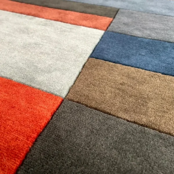 Close up to rug after Paul Klee "Fire in the Evening" custom handmade art rug