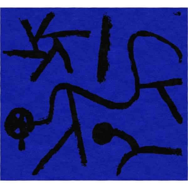 Alfombra hecha a mano a medida por Rug Your Life, inspirada en el cuadro «Dieser Stern lehrt beugen» («Esta estrella enseña a inclinarse») de Paul Klee. Los colores de la alfombra son azul oscuro y negro.